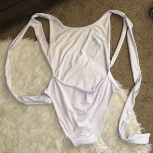 White silky bodysuit never worn size small